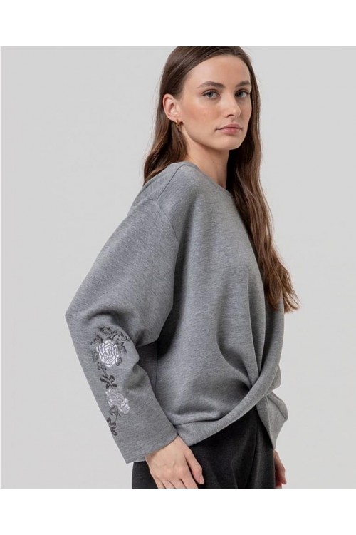 Sudadera con cruce en bajo y b...