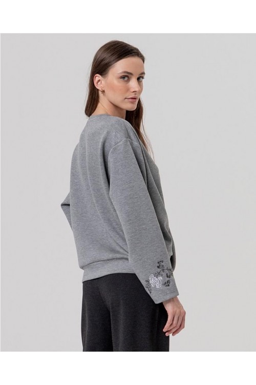 Sudadera con cruce en bajo y b...